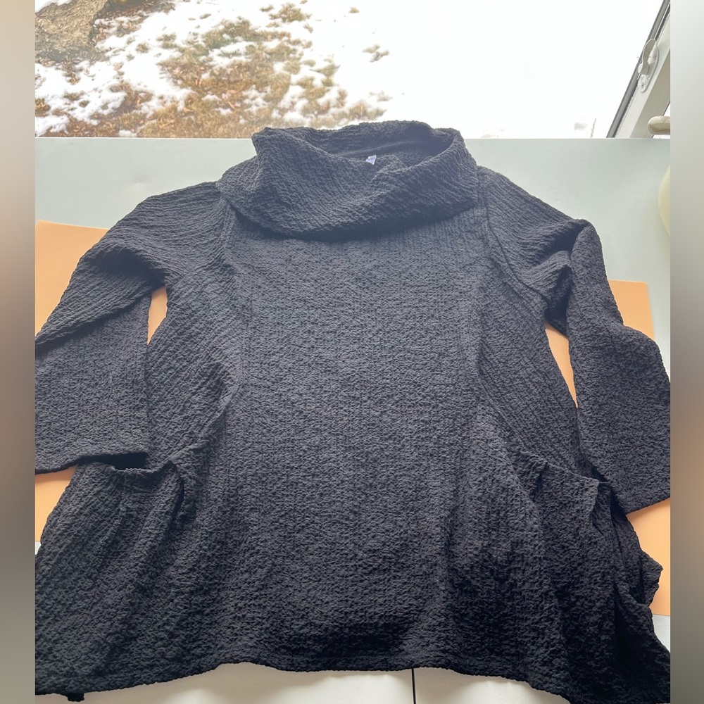 Elegant Black Cowl Neck shirt. Light‎ weight with Flared bottom with pockets